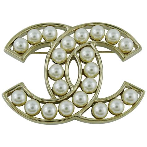 chanel camellia diamond brooch|chanel pearl brooch price.